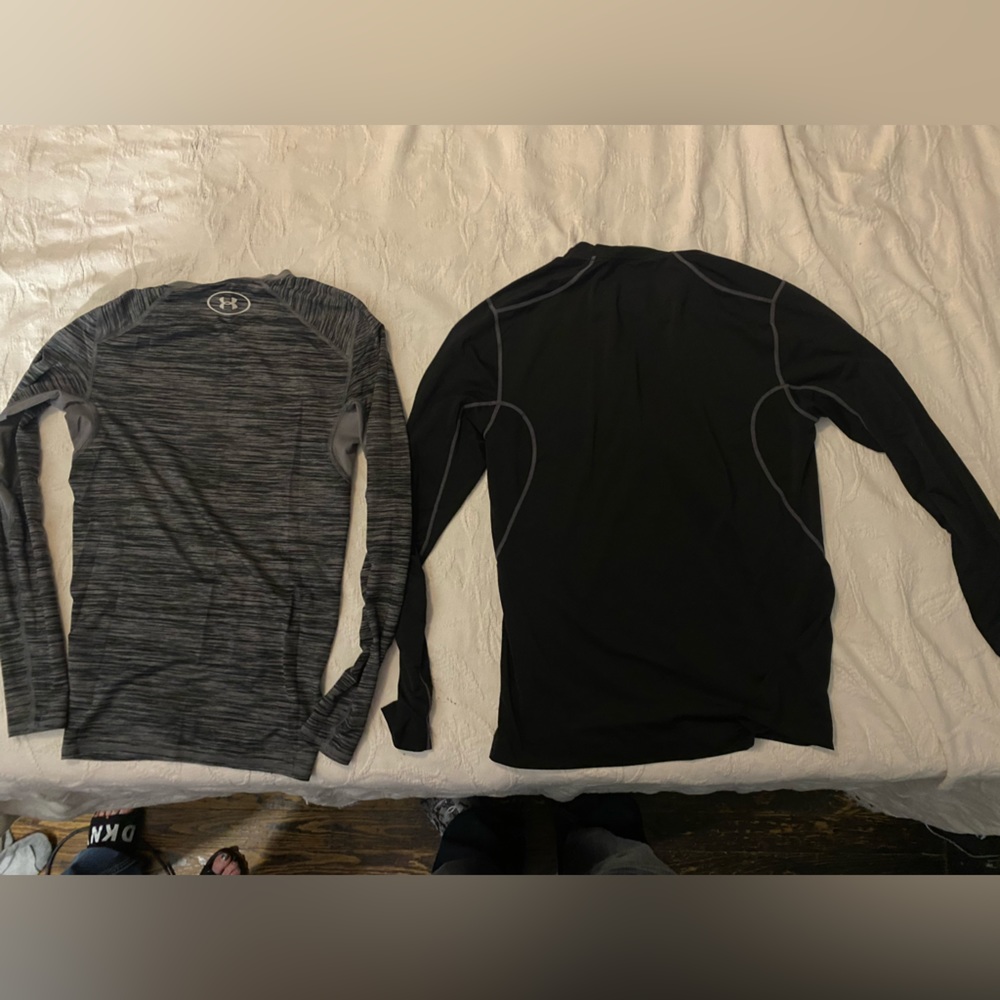 2 Activewear shirts. 1 Under Armour and 1 Nike.
